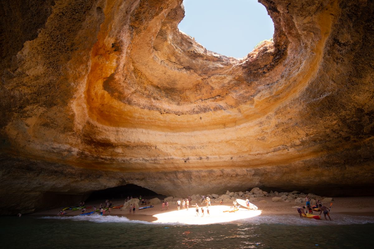 Benagil sea cave with a circular skylight opening in the roof, Algarve