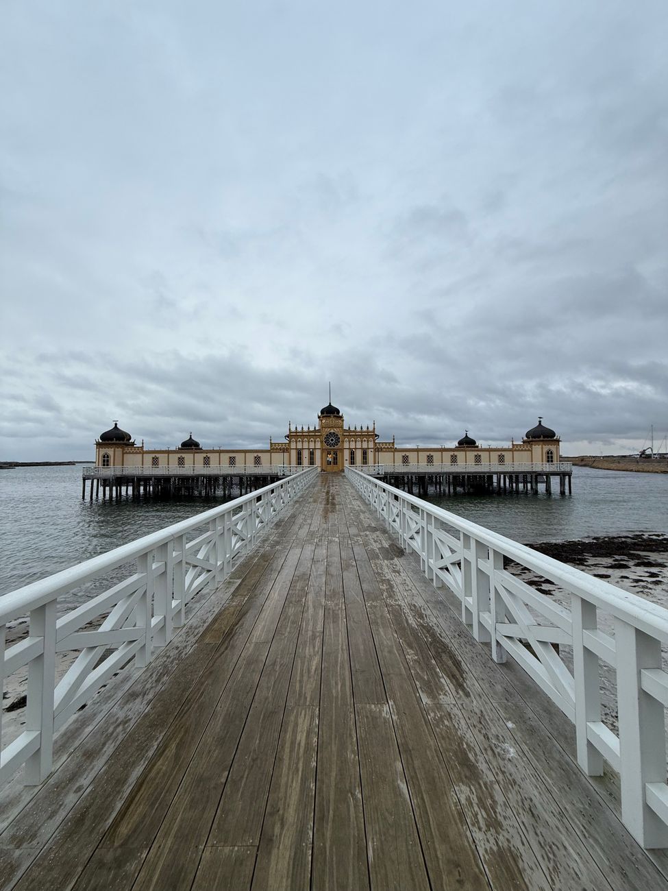 A wooden cold-bathing house on stilts over the water in Bohuslän
