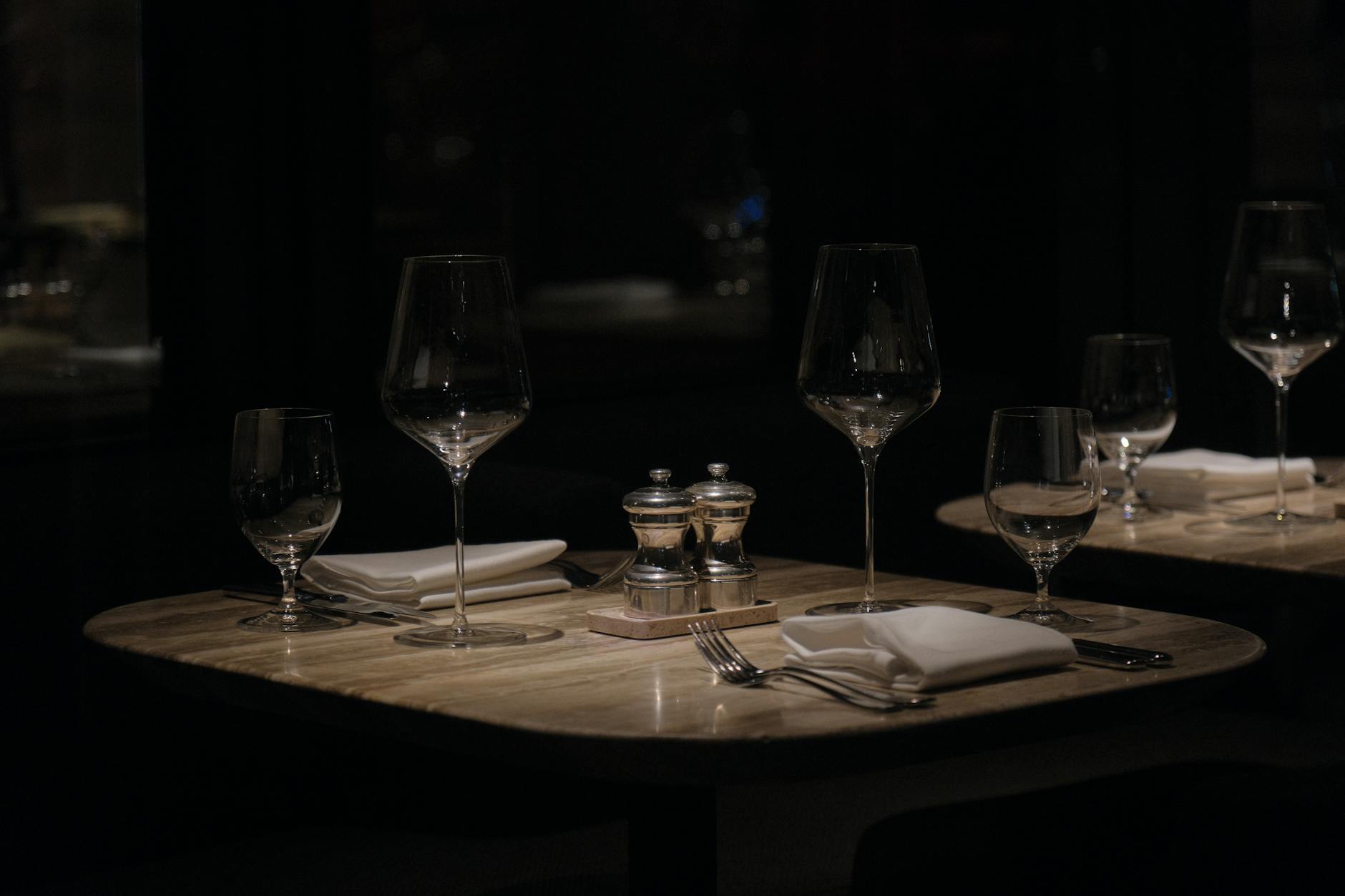 Wine bar night interior dark intimate wooden table Sofia Bulgaria