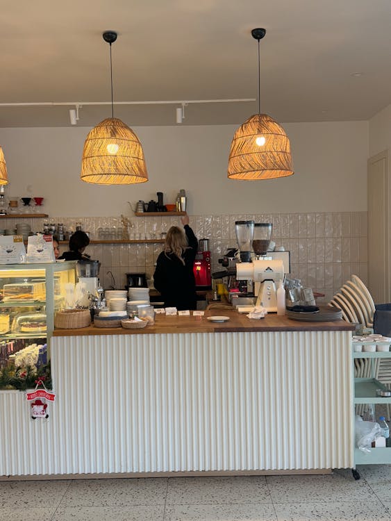 Café interior barista coffee bar Santiago Chile specialty café warm lighting
