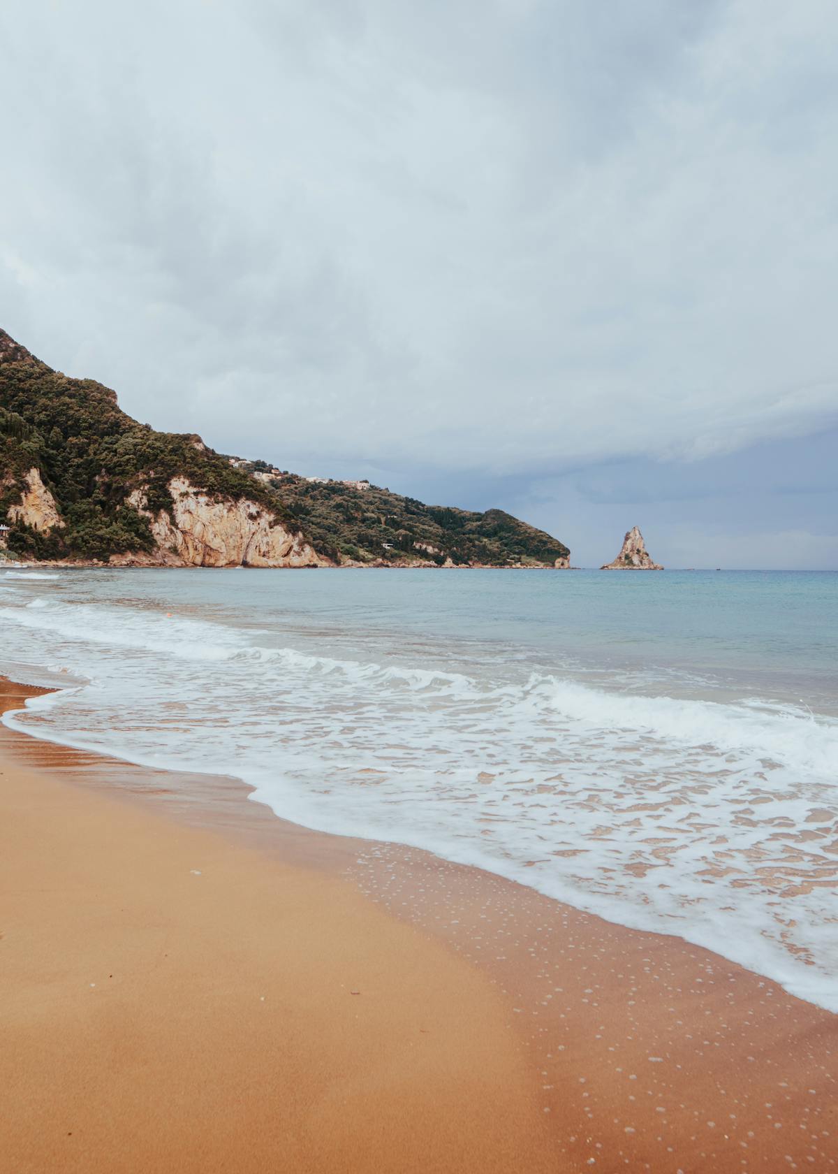 Gentle waves on the beach at Agios Gordios, Corfu