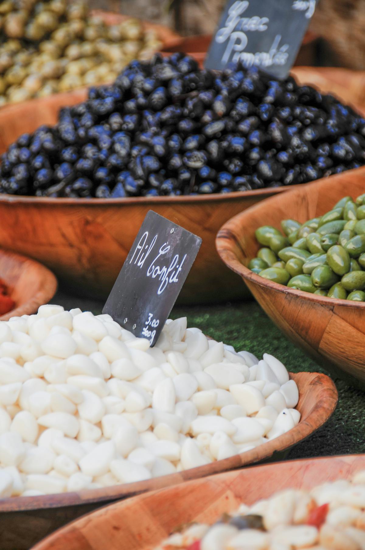 Olives and garlic at an open-air market on the French Riviera