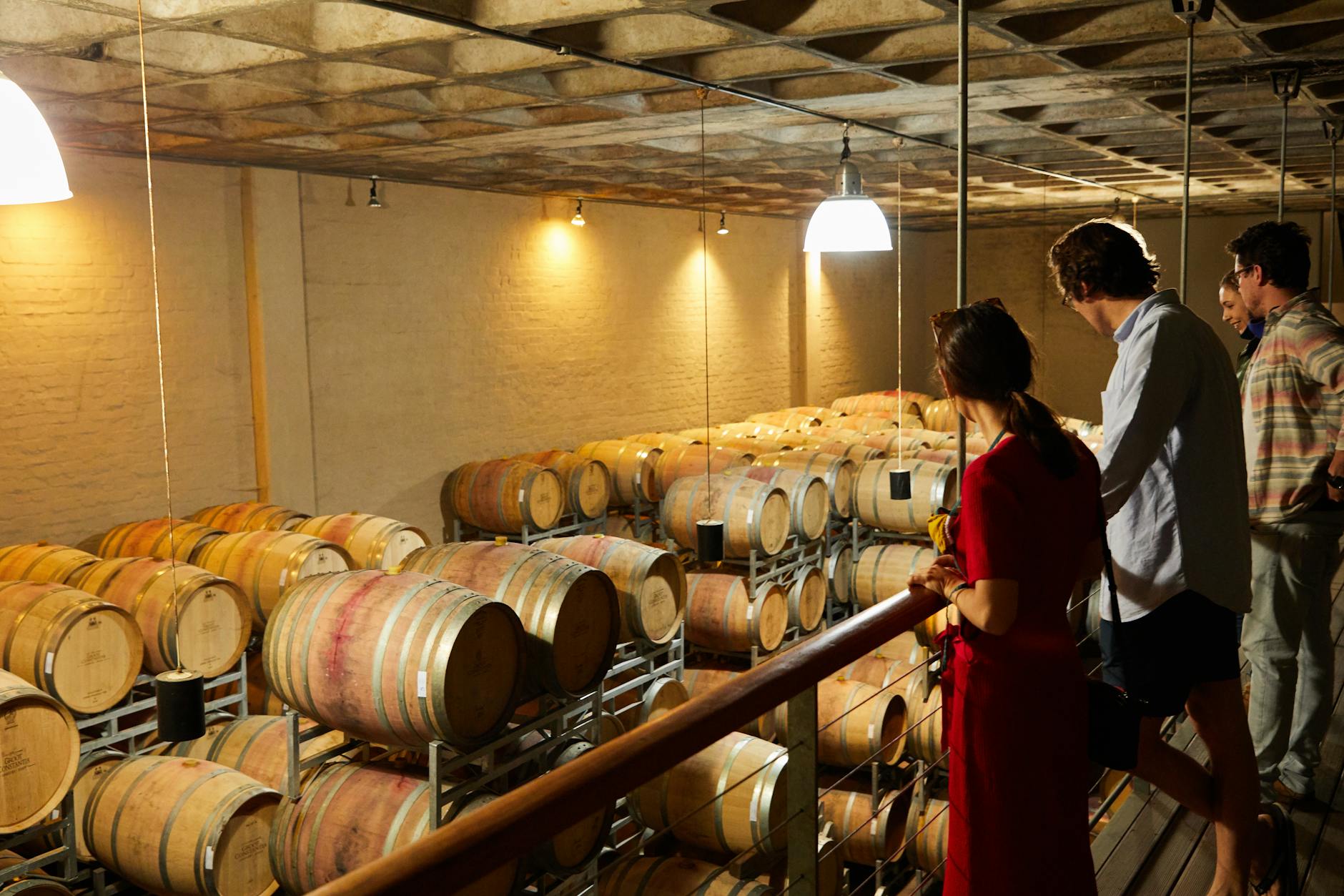 Winery tasting table wooden barrels elegant wine