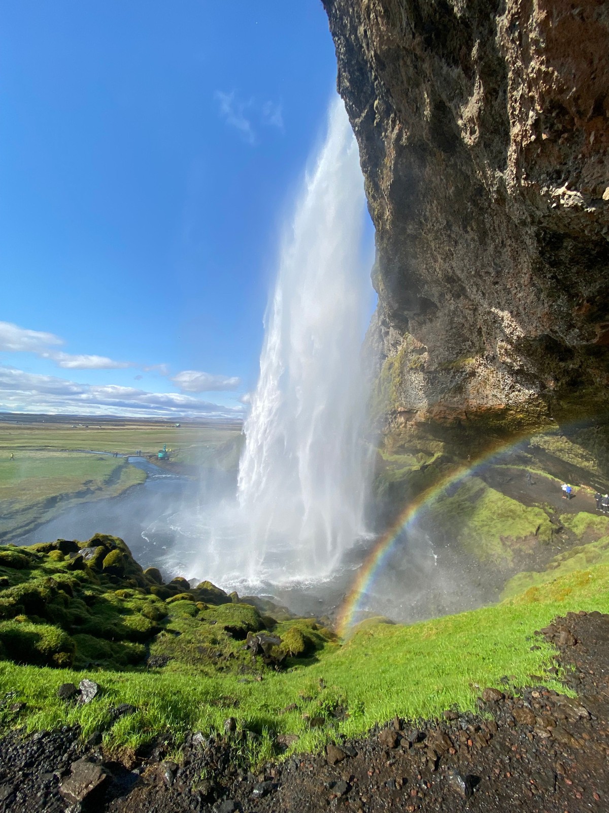 Seljalandsfoss waterfall with a path leading behind the falling water