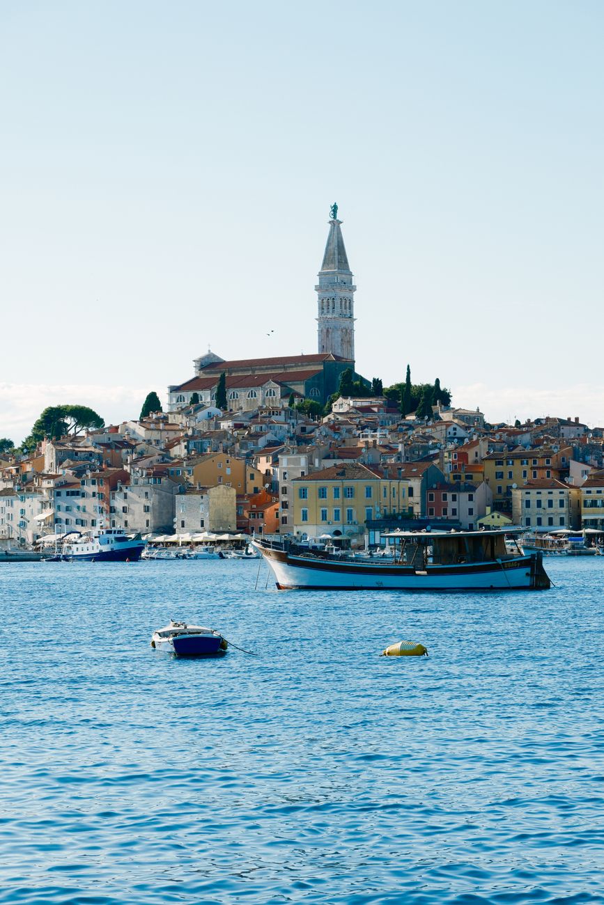 Rovinj old town with St Euphemia church tower and the Adriatic harbour