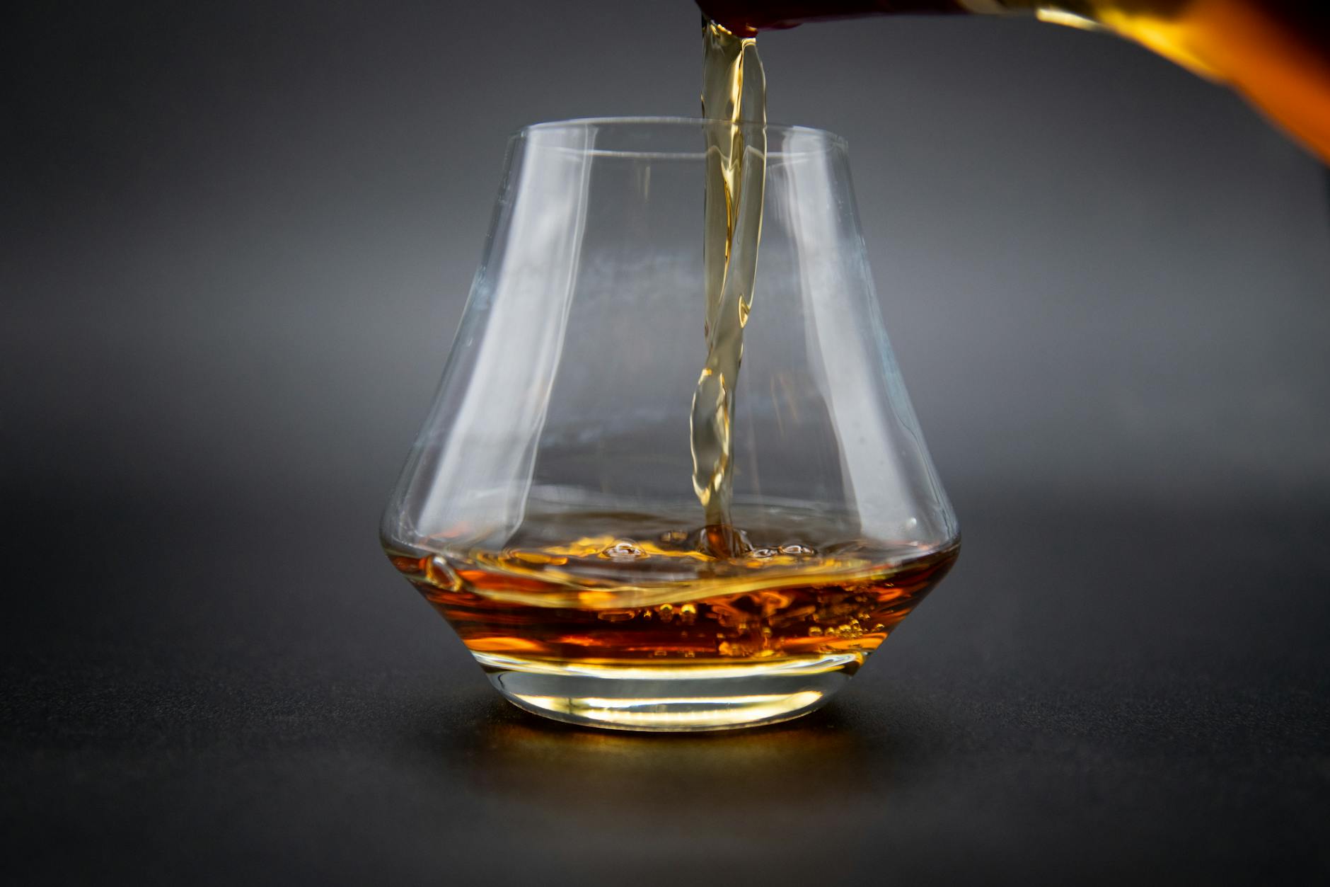 Nikka Yoichi Distillery Hokkaido whisky glass pour dark amber coal fire pot still