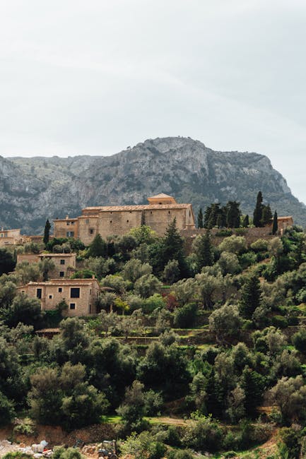 Deià village clinging to a cliff on the Mallorca coast