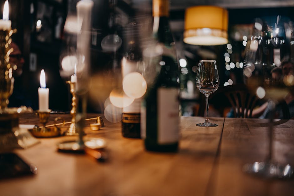 Underground wine bar stone cellar candles dark atmospheric glasses