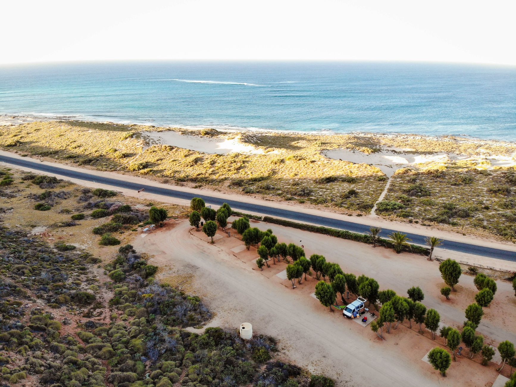 Aerial view of the coastal road and turquoise waters near Exmouth, Western Australia