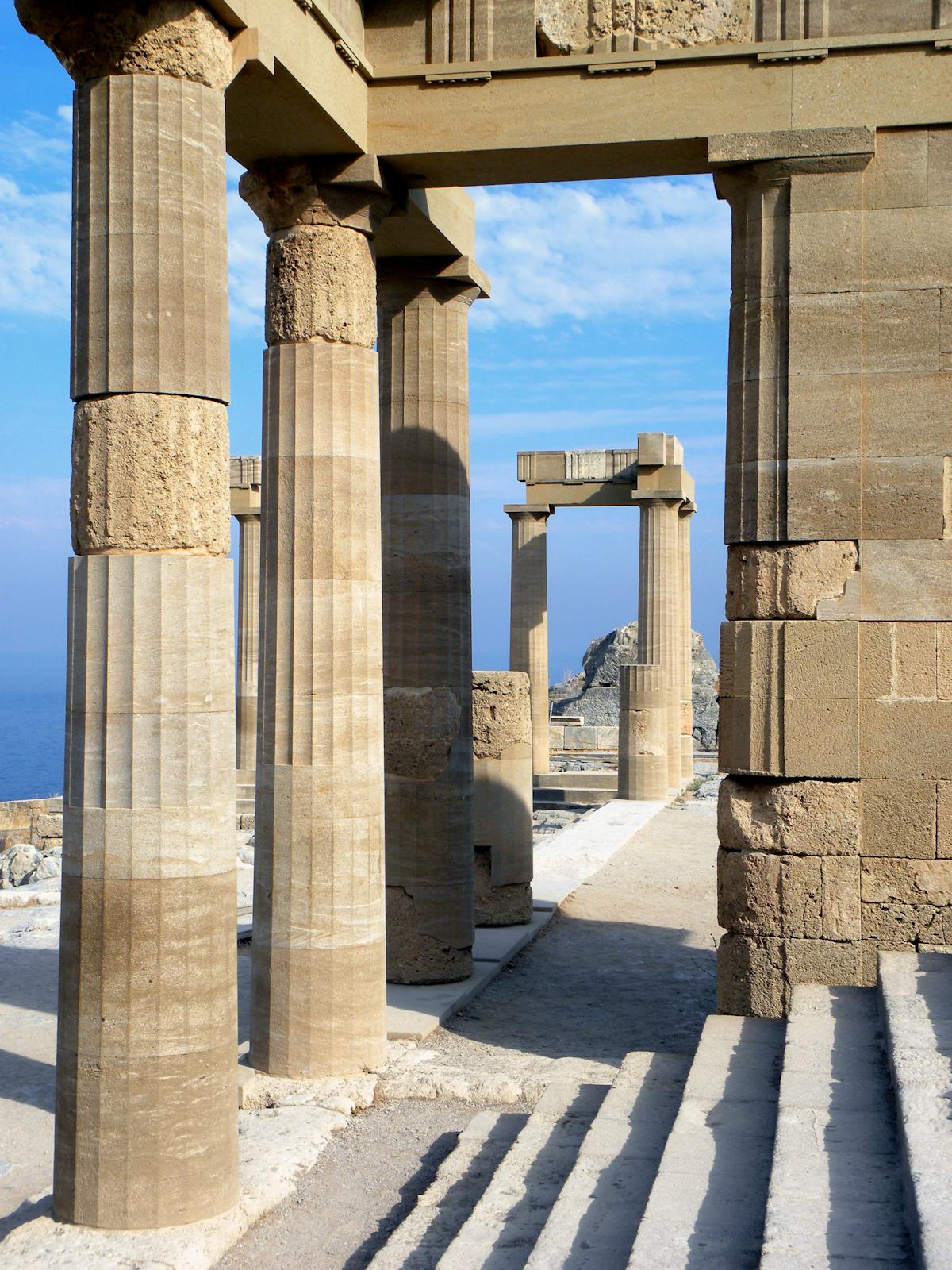 Ancient Greek ruins of the Lindos acropolis on a cliff above the sea, Rhodes