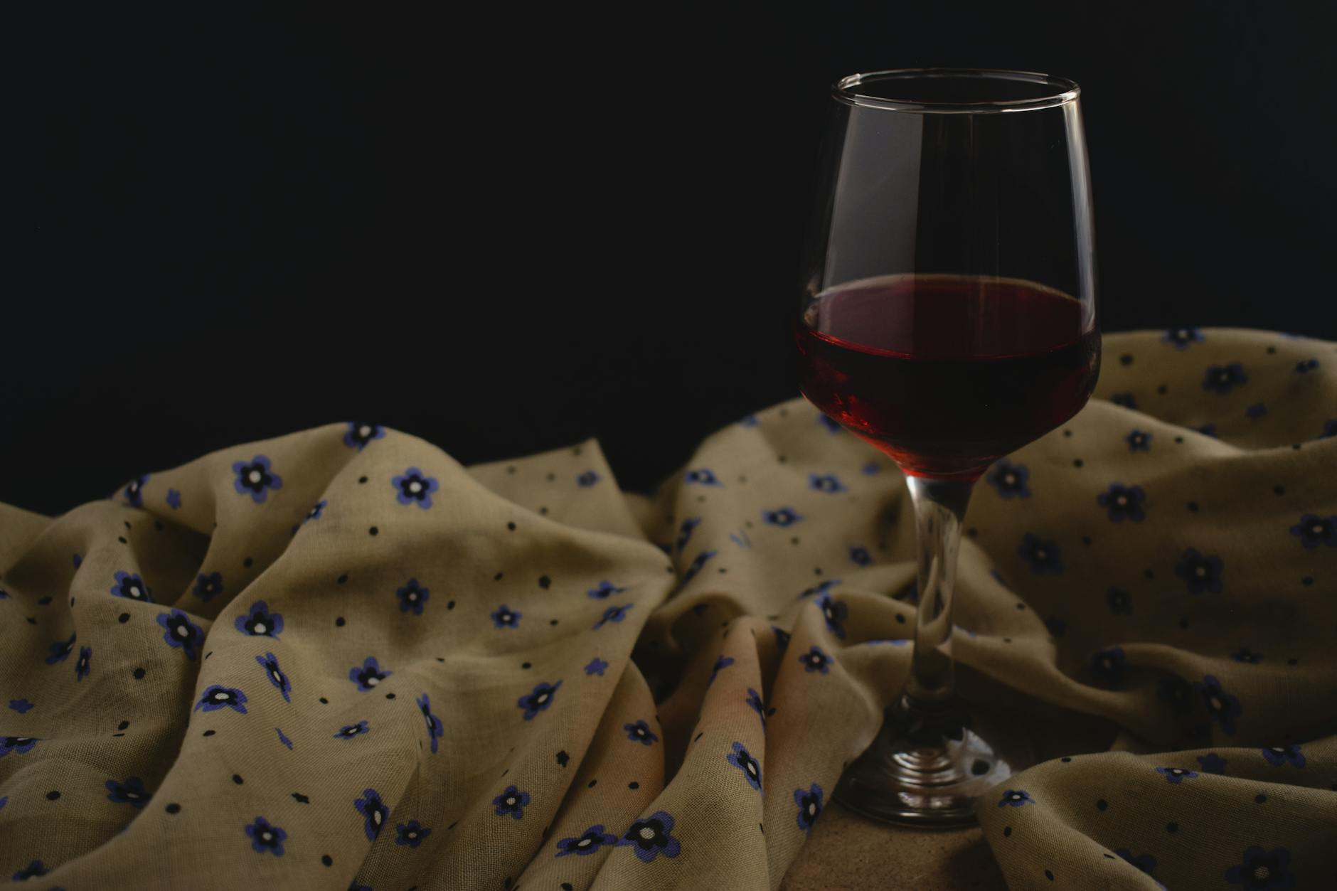 red wine glass Tannat dark ruby South America evening